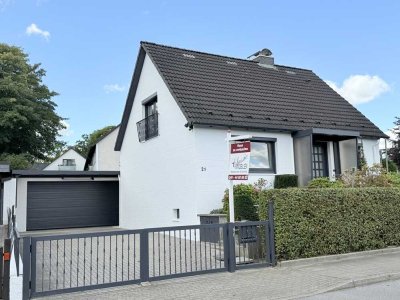Attraktives 5-Zimmer-Einfamilienhaus
mit Garten, Keller und geräumiger Doppelgarage im Ortskern