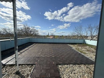 + Wohnen mit großer Dachterrasse+