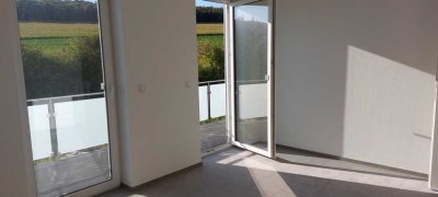 Neubau-Erstbezug - Moderne 3-Zi.-Wohnung mit Balkon und TG für gehobene Ansprüche