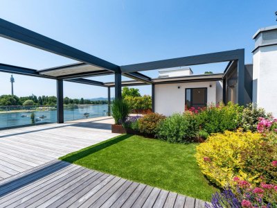 LEBENSQUALITÄT AUF HÖCHSTEM NIVEAU! PENTHOUSE MIT ÜBER 400 M² FLÄCHE ZUM LEBEN &amp; GENIESSEN IN BESTLAGE AN DER ALTEN DONAU – UNVERBAUBARER BLICK AUFS WASSER INKLUSIVE!