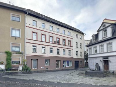 Solides Wohn- / Geschäftshaus mit 9 Einheiten in zentraler Ortslage