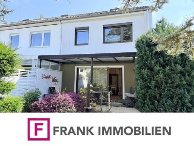 FRANK IMMOBILIEN Liebenswertes Reihenendhaus mit weitläufigem Gartenglück  sucht kreative Hände!