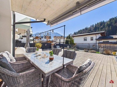 Familienfreundliche Terrassenwohnung mit 2 Tiefgaragenstellplätzen in Niederndorf zu verkaufen
