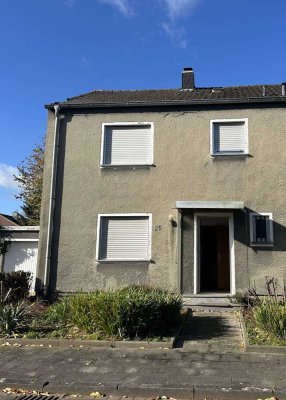 Sanierungsbedürftige Doppelhaushälfte mit Potenzial, ideal für mutige Projektstarter