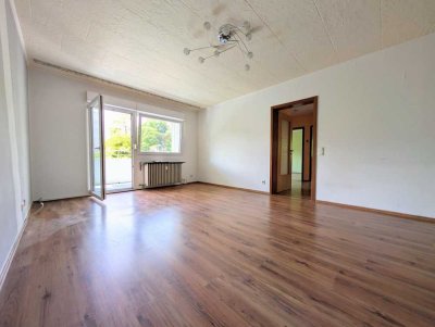 Natur nah, Stadt nah: 4 Zimmer, Südbalkon & eine eigene Garage.