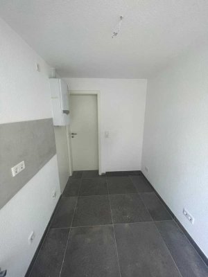 Erstbezug nach Sanierung: Helle 1-Zimmer-Wohnung mit Balkon und optionaler Einbauküche