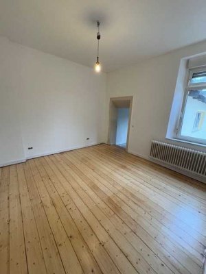 Charmante 3-Zimmer-Altbauwohnung mit Gartenmitbenutzung in saniertem Einfamilienhaus