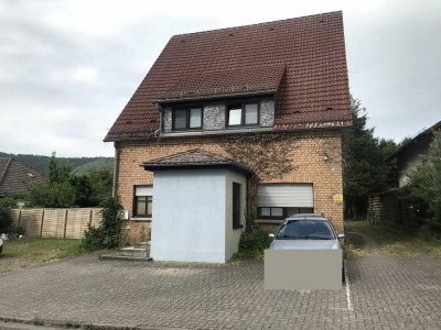 Mehrfamilienhaus mit großem Grundstück in Münchweiler a.d.Rod