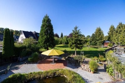 Stilvolle 3,5-Raum-Erdgeschosswohnung mit wunderschönen Garten und Schwimmteichin Scharbeutz