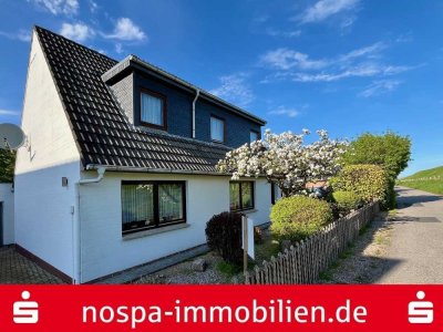 Beliebte Lage am Eiderdeich! Klassisches Einfamilienhaus mit Garage und PKW-Stellplatz