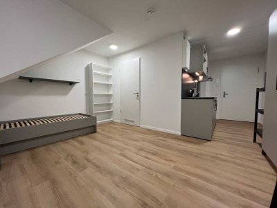Moderne 1-Zimmer Dachgeschosswohnung - möbliert - im 4. OG (Erlangen Zentrum - Erstbezug - Neubau)
