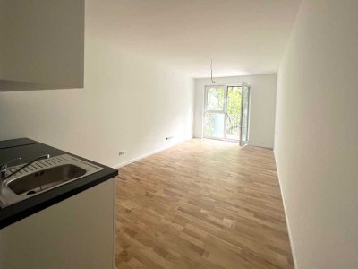 Sofort bezugsfrei: Top Neubau-Apartment mit EBK, Keller & Balkon