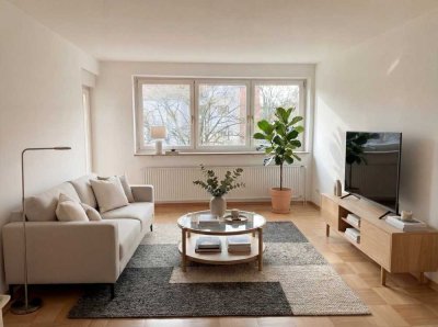 Renovierte 3-Zimmer-Wohnung in grüner Lage mit großem West-Balkon und Einzelgarage