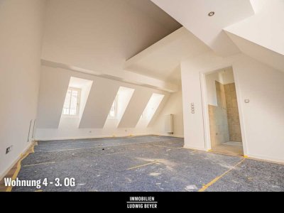 Hochwertige zwei Zimmer Dachgeschosswohnung mit großer Dachterrasse