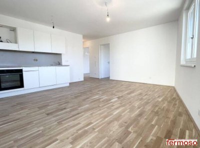Helle Neubauwohnung mit Wohnküche, 2 Schlafzimmern &amp; 2 Balkonen