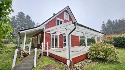 immo-schramm.de: Neuwertiges Schwedenhaus mit Veranda und traumhafter Gartenanlage