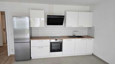 Erstbezug nach Sanierung mit Balkon und Einbauküche: Exklusive 3-Zimmer-EG-Wohnung in Schrobenhausen