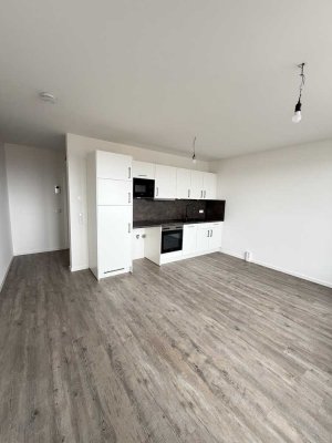 Erstbezug in zentraler Lage: Helle 2-Raum-Wohnung mit Balkon und Einbauküche
