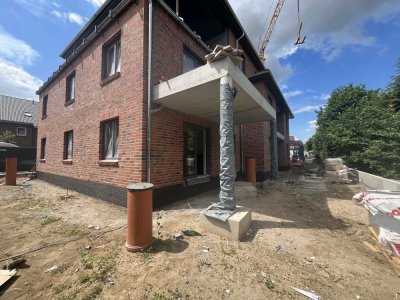 Neubau-Eigentumswohnung im Erdgeschoss mit Terrasse und grüner Umgebung!