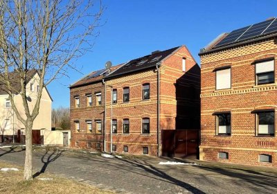 Ideal für Familien: gemütliche Doppelhaushälfte in Raguhn mit großem Garten und idyllischem Teich