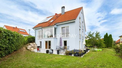 Modernes Einfamilienhaus mit Einliegerwohnung in Hanglage und tollem Ausblick