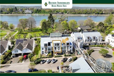 Großzügige Maisonette-Wohnung mit zwei Balkonen, Einbauküche und TG-Stellplatz in direkter Rheinlage