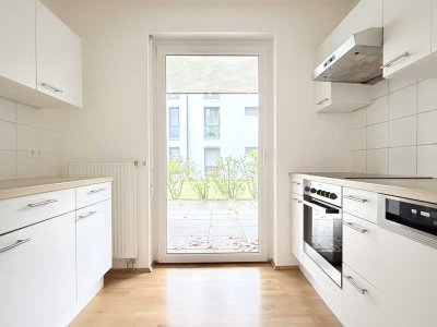 Sonnenverwöhnte Erdgeschosswohnung mit Terrasse, moderner Einbauküche & Tageslichtbad