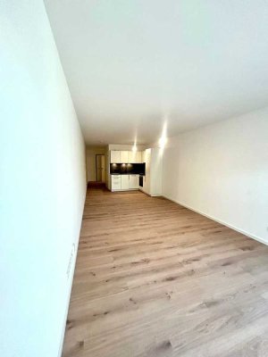 Exklusiver Neubau: 2 Zimmer-Wohnung Balkon überdacht | EBK | Abstellraum | TG