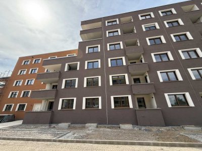 Erstbezug einer sonnenhellen 1,5-Zimmer-Neubauwohnung mit Loggia im 5.OG – barrierefrei & durchdacht