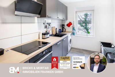 Kapitalanlage in stilvollem Ambiente - kernsanierte 2-Zimmer-Altbauwohnung mit Balkon und EBK