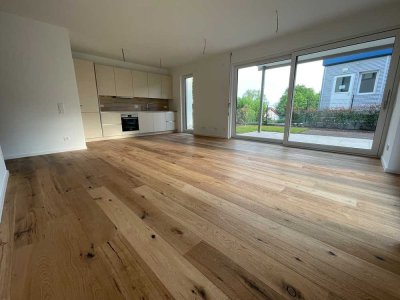 3-Zimmer-Erdgeschoss-Wohnung mit Privatgarten, Einbauküche & TG-Platz