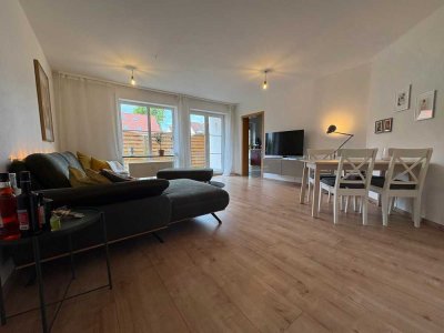 Moderne Erdgeschosswohnung mit Gartenanteil