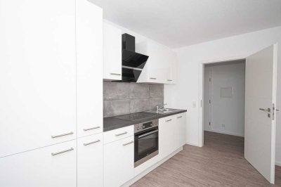 Komplett-sanierte 2-ZKB mit Aufzug, teilmöbliert inkl. Einbauküche und Garagenstellplatz