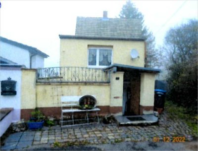 Einfamilienhaus mit großem Grundstück in grüner Ortsrandlage