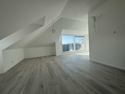 Erstbezug mit Dachterrasse: Geschmackvolle 3-Zimmer-Dachgeschosswohnung mit geh. Innenausstattung