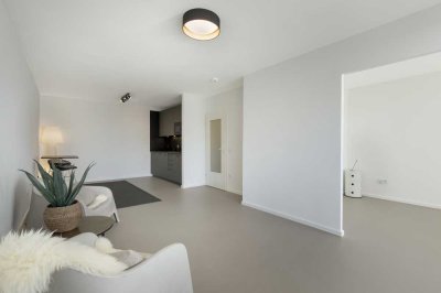 Modern sanierte 2-Zimmer-Wohnung mit Weitblick und Tiefgaragenstellplatz auf St. Pauli – Erstbezug!