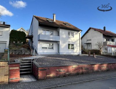 Zwei- bis Dreifamilienhaus mit Garage und großem Grundstück