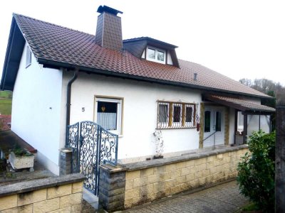 Einfamilienhaus mit Garten, Garage und Fernsicht in Sippersfeld!