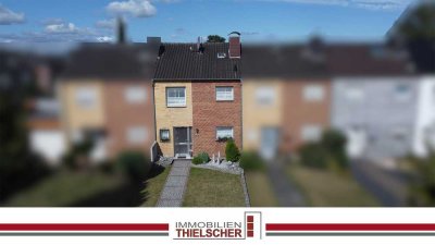 Charmantes Reihenmittelhaus mit schön angelegtem Garten und gutem Raumkonzept in zentraler Lage