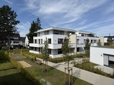 Moderne Terrassenwohnung mit Garten