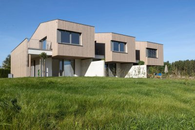 Reihenhäuser mit der offenen Struktur eines Einfamilienhauses - Eckreihenhaus