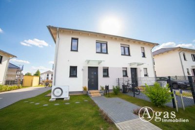 Repräsentatives Wohnen an der Stadtgrenze: Hochwertige DHH mit Privatgrundstück in gehobener Siedlun