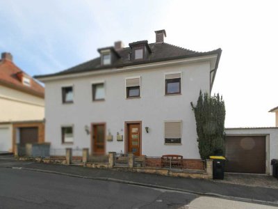 Vermietete Doppelhaushälfte mit Südgarten und Zierteich in Bad Hersfeld