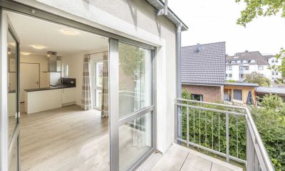 Ruhig gelegene, helle 2-Zimmer-Seniorenwohnung mit Balkon und Einbauküche in Neumünster