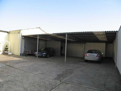 Einzigartiges Investitionsobjekt: Großes Wohnhaus mit Lagerhalle und Garagen – Raum für Ihre Vision