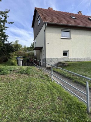 DHH mit schönem bewachsenen Grundstück in bevorzugter Lage