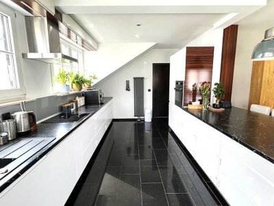 Neu renovierte Maisonette-Wohnung mit herrlicher Dachloggia