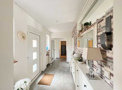 Exklusive Erdgeschosswohnung mit Haus-im-Haus-Charakter.