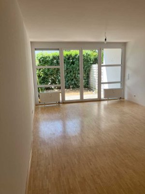 Schicke 2-Zimmer-Erdgeschosswohnung mit Terrasse und kleinem Garten in Unterbiberg