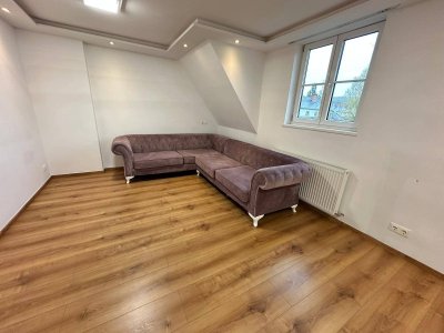 3-Zimmer Dachgeschosswohnung mit Garten